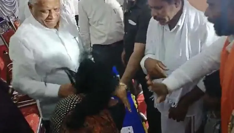 Min Slaps woman