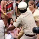 Man handling woman