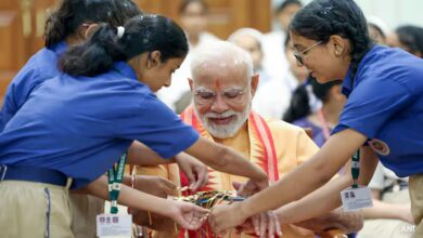 A touching moment of humanity and love as PM ties Rakshi to students