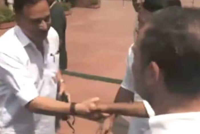 Rahul Gandhi shakes hands with opposition MPs, symbol of political restraint and cooperation
